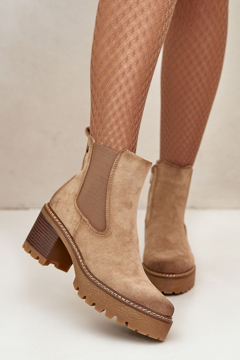 Velmorin suede block heel boots in eco-suede with side-zip closure, fleece lining, and block heel for comfort and style.