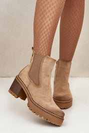 Velmorin suede block heel boots in eco-suede with side-zip closure, fleece lining, and block heel for comfort and style.