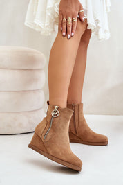 Vermira Insulated Wedge Booties in soft eco suede with inner side zipper, ideal for fall-winter fashion, styled with white dress.