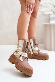 Bravora leather buckled platform boots with large buckle and lace-up front, featuring sturdy platform and stylish design