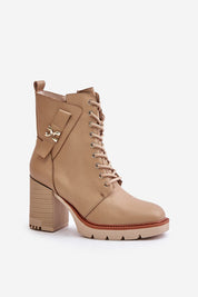 Noctera Luxe Zip-Up Heeled Boots in beige eco leather with block heel, gold-accented strap, and side zip for urban sophistication and comfort.