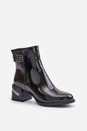 Glossy black ankle boot with silver buckle and chunky heel, featuring a modern and stylish design for fashion-forward footwear enthusiasts.