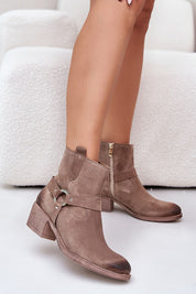 Eranise Suede Cold-Weather Boots with low heel and stitched suede stripes, perfect for cool days.”}]}.