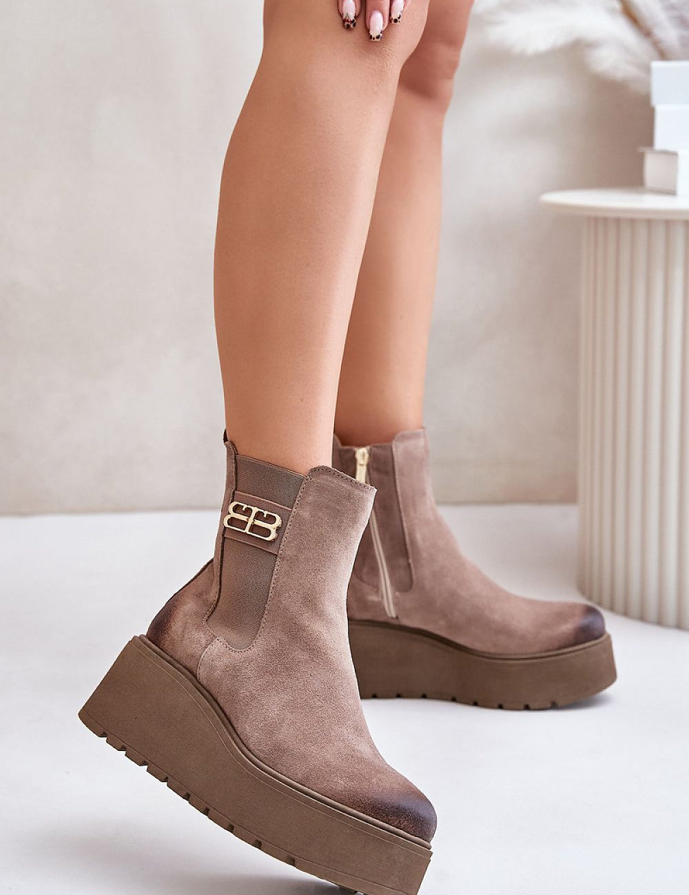 Varelyn suede platform boots with side zipper and decorative detail, featuring a thick heel for height and felt-insulated warmth.