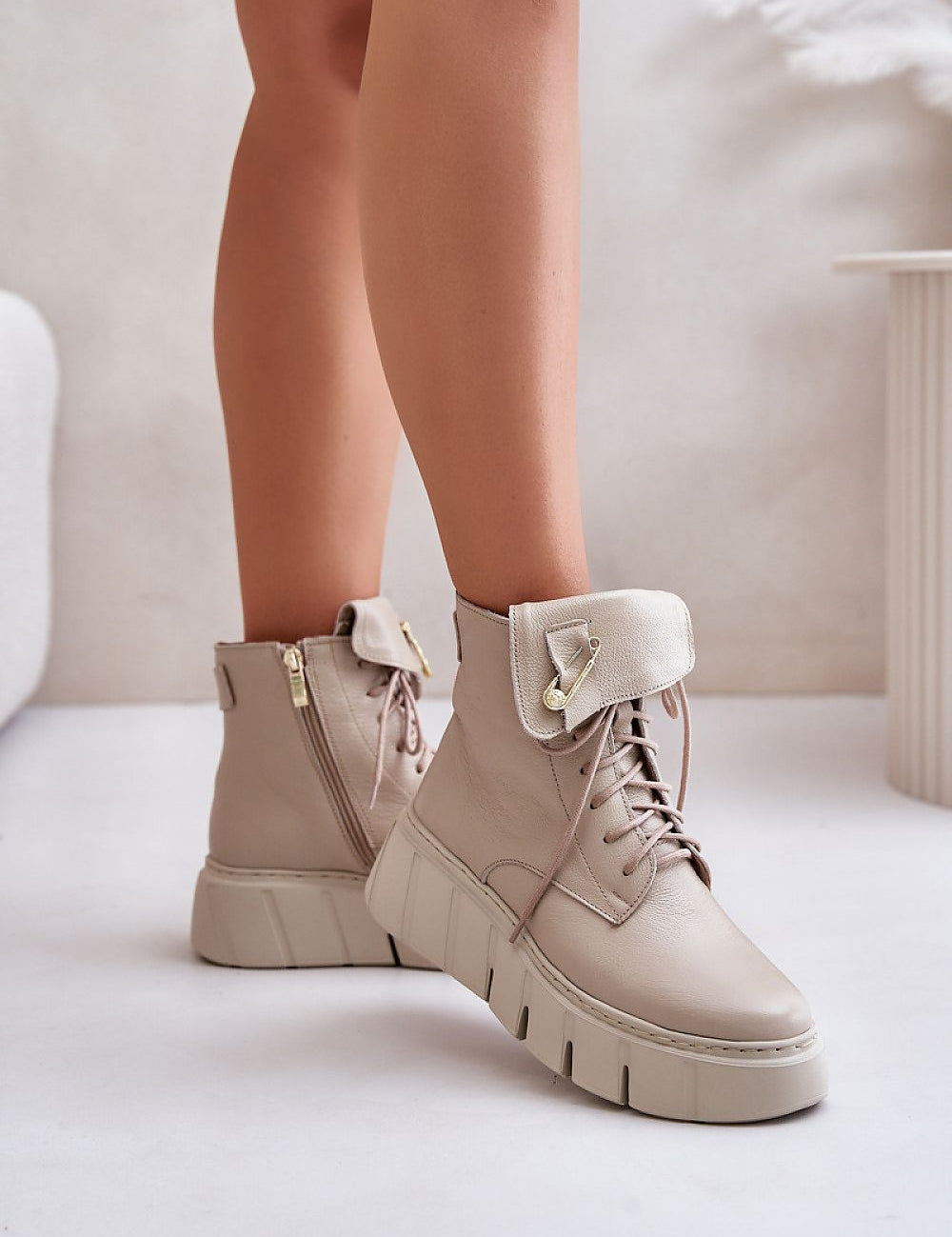 Beige Kaelith Leather Platform Boots with safety pin accent and side zipper