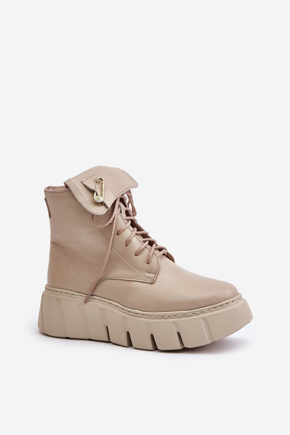 Kaelith leather platform boots with front lacing, side zipper, rounded toes, and safety pin accent for urban edge and winter warmth.