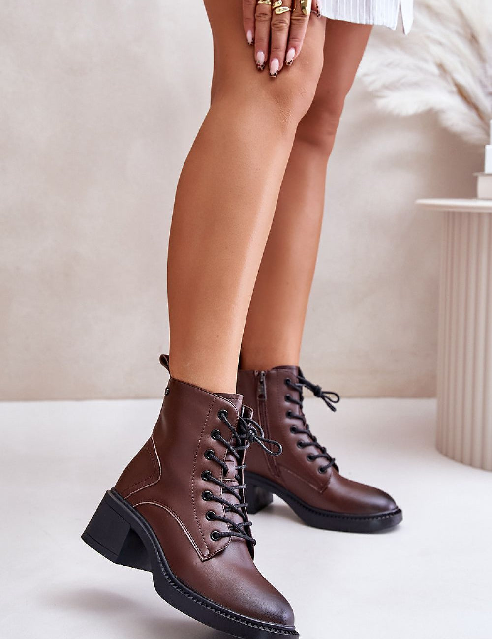 Milvera leather lace-up heel boots with block heel, showcasing elegance and comfort in an ankle-high silhouette, perfect for autumn.