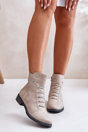 Norelle Minimal Zip Boots in eco leather, with a flat heel and side zipper for warmth and comfort, perfect for cold-weather outings.