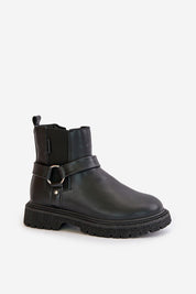 Black leather jodhpur boots with buckle and rugged sole on a white background.
