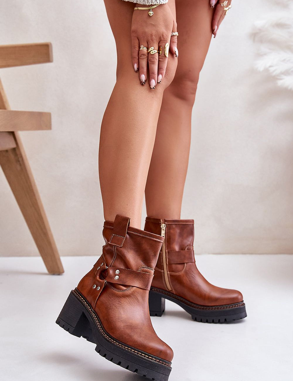 Nevarelle Leather Platform Heel Boots with side zipper, featuring a sleek design and rounded toe for stylish comfort and balance.