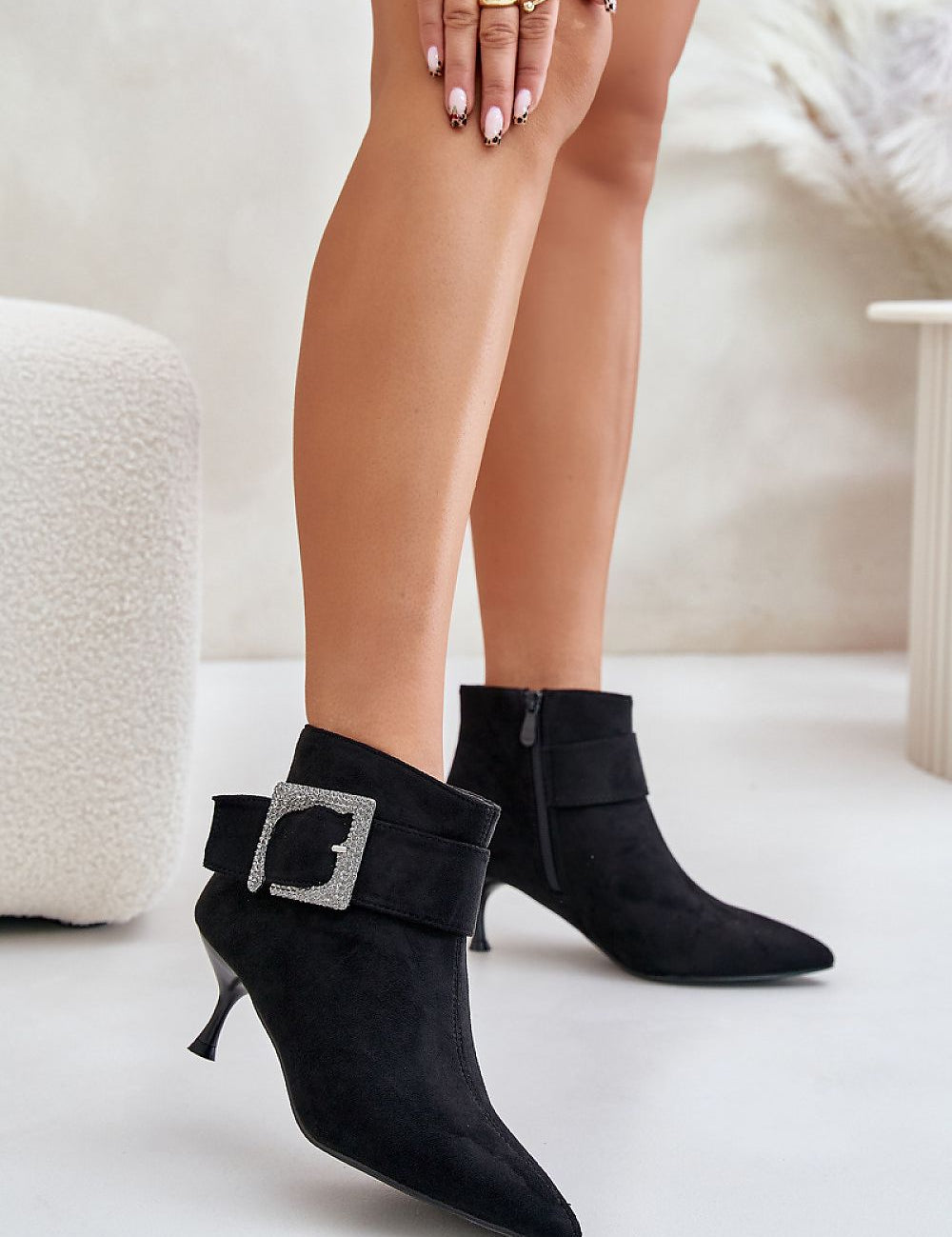 Velouryne Bucklash suede heel boots with large side buckle, pointed toe, and zipper closure for elegant style and comfort in black eco suede.