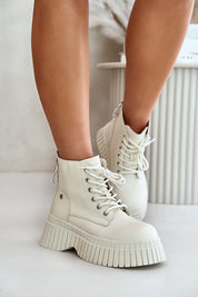 Tavareen Griptrail Insulated Trapper Boots in natural leather with thick platform sole and side zipper for secure fit.