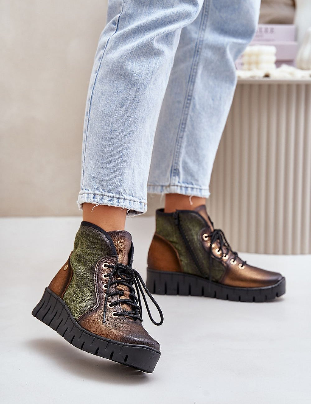 Thessari Groundline Leather Utility Boots with platform heel, in brown and green, showcasing rugged design and comfortable fit.