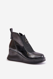 Elvastra Platform Leather Buskin Boots with 8 cm heel, side zipper, and decorative detail, offering elegance and comfort.