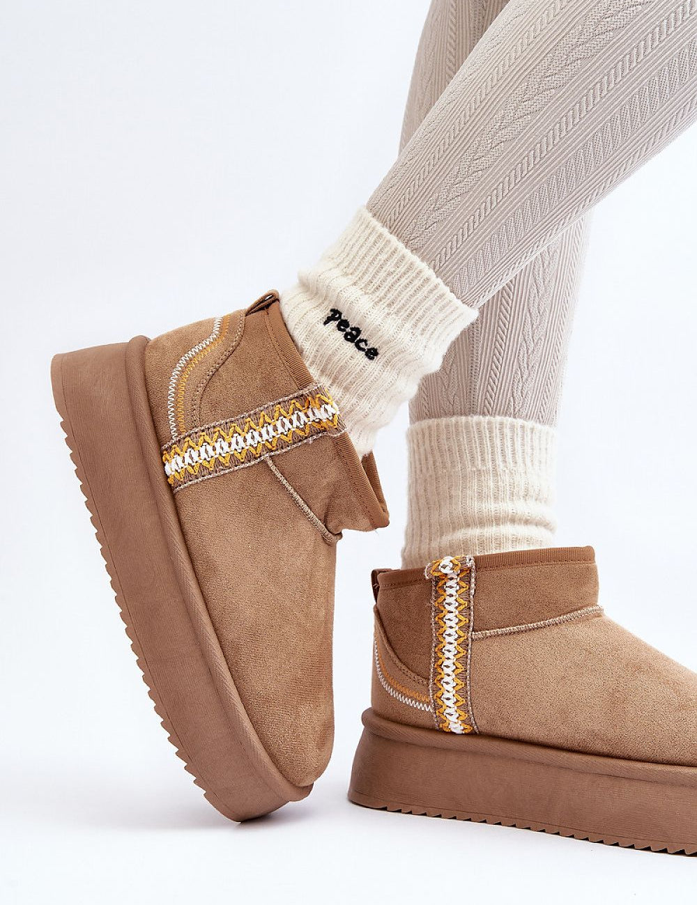 Azmira Aztec Platform Snow Boots in tan eco suede with Aztec pattern, plush fur lining, and thick platform for warmth and style.