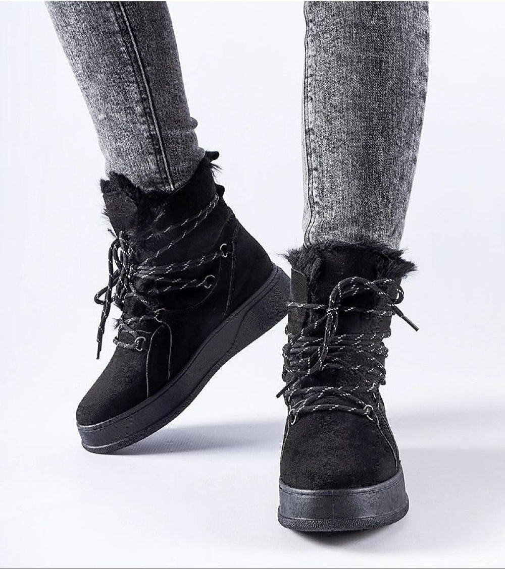 Slip-on black snow boots with 4 cm platform, insulated lining, and eco leather, perfect for winter city wear and countryside walks.