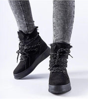 Slip-on black snow boots with 4 cm platform, insulated lining, and eco leather, perfect for winter city wear and countryside walks.