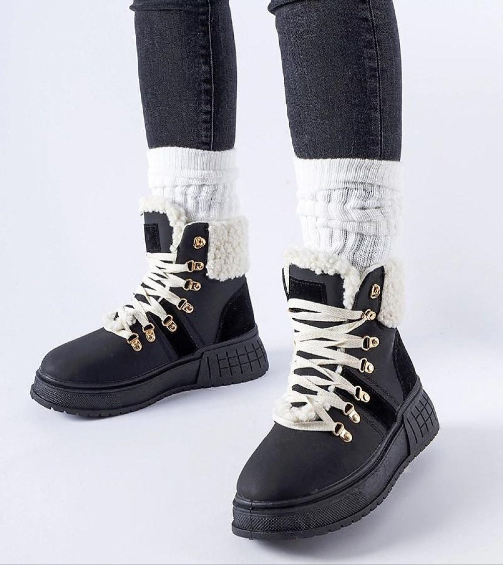 Alt Tag: Drosmere Platform Work Boots with high ankle cut, laced closure, and stitched detailing, ideal for cooler weather.