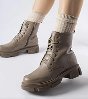 Cavaryn Insulated Lace-Up Winter Boots with ankle-high design, side zipper, flat heel, and thick rubber sole for urban and adventurous use.