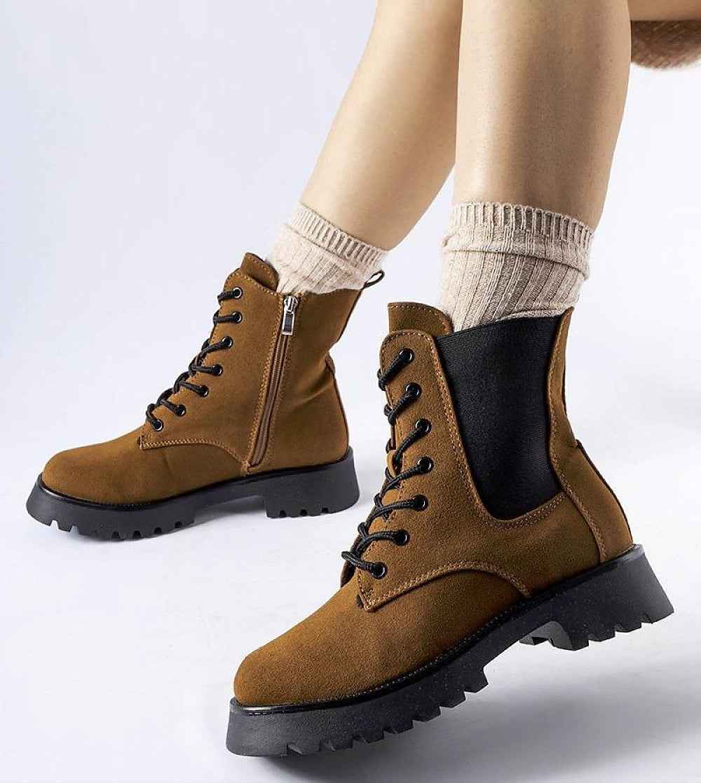 Brown Everleigh Ridge Winter Boots with chunky sole, side zipper, and laces for style and comfort on cold days.