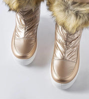 Igne fur-lined winter boots with soft fur collar and shiny exterior, designed for warmth and style. Perfect for cold weather fashion.
