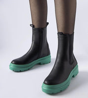 Vereliane ankle boots with vegan leather upper and olive rubber sole, featuring practical side zipper and 4 cm flat heel for comfort.