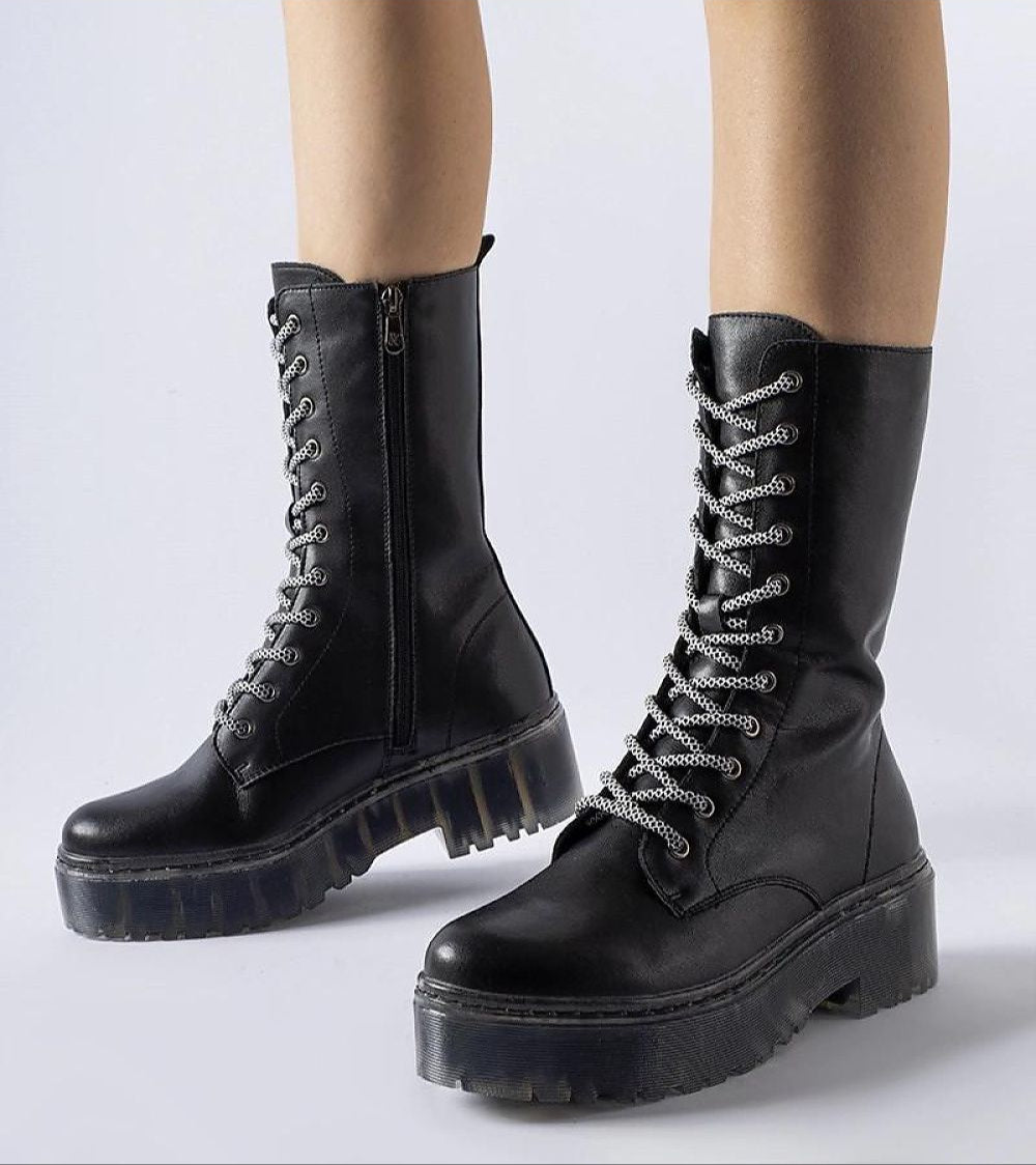 Black lace-up eco leather insulated winter boots with mid-high silhouette and chunky sole, perfect for warmth and style.