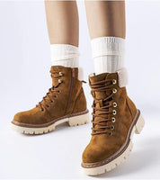 Cirema insulated winter trapper shoes made of eco leather with side zipper, showing ankle-high design and rubber sole for cold days.