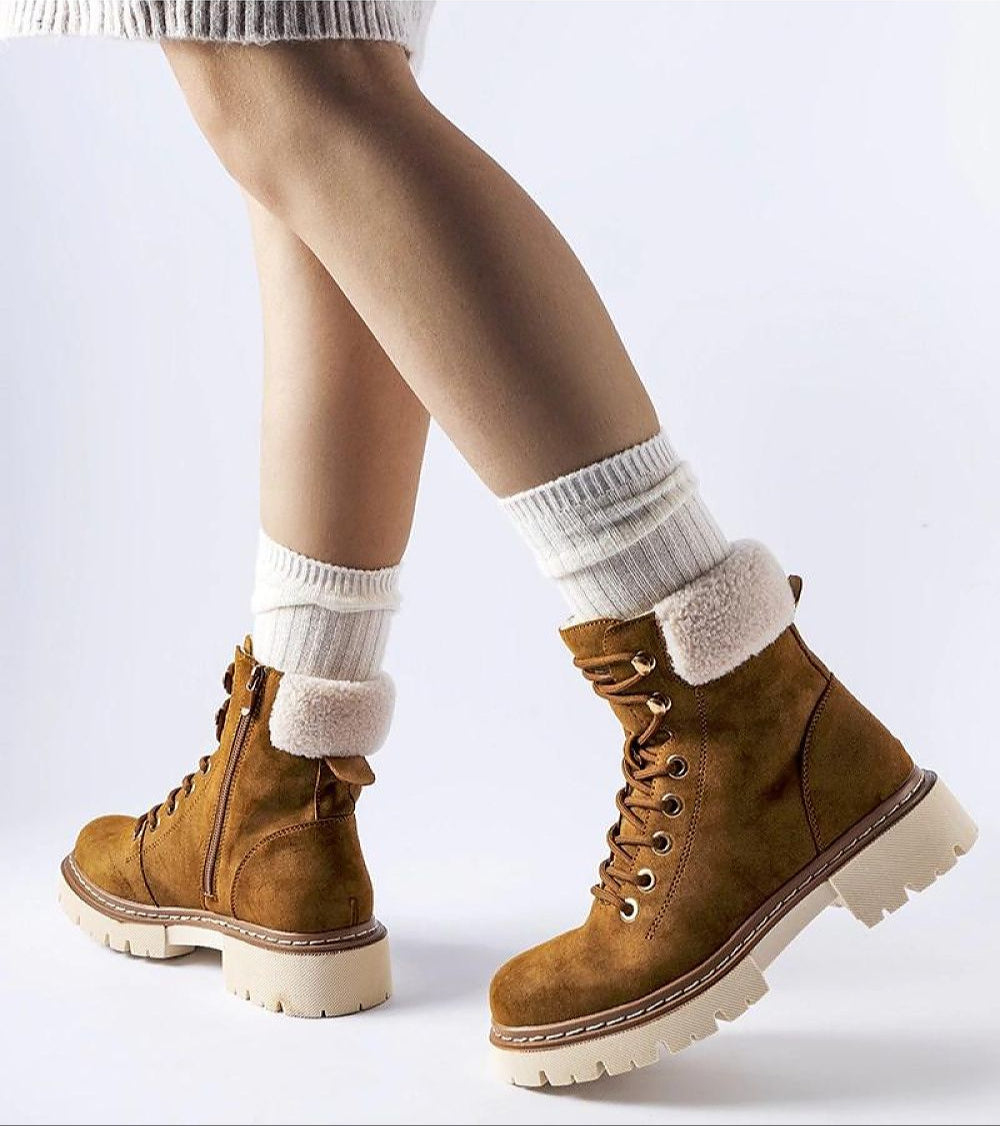 Person wearing Cirema insulated winter trapper shoes with durable eco leather and ankle-high coverage.