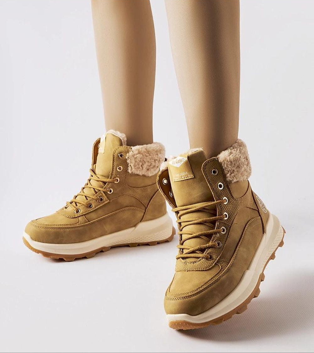 Esmyelle insulated winter sneakers in eco leather, with a 5 cm rubber sole and lace-up design for stability and comfort in cold weather.