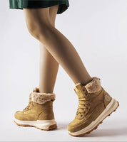 Esmyelle insulated winter sneakers with eco leather, supportive ankle cut, and 5 cm rubber sole, perfect for cold-weather comfort.