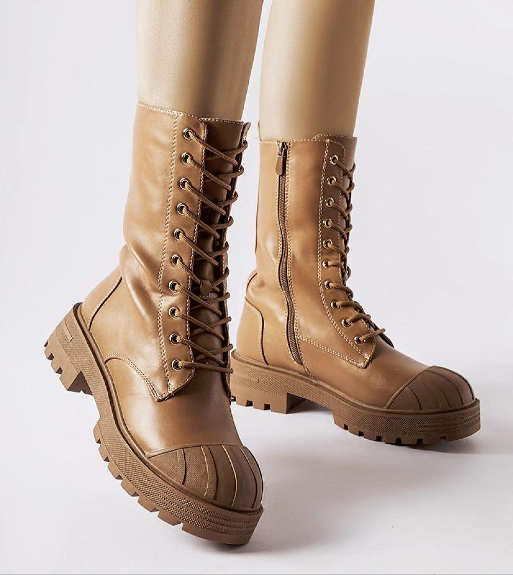 Thavine insulated lace-up work boots with eco leather, high-cut shaft, and flat 4.5 cm heel for stable, warm winter wear.