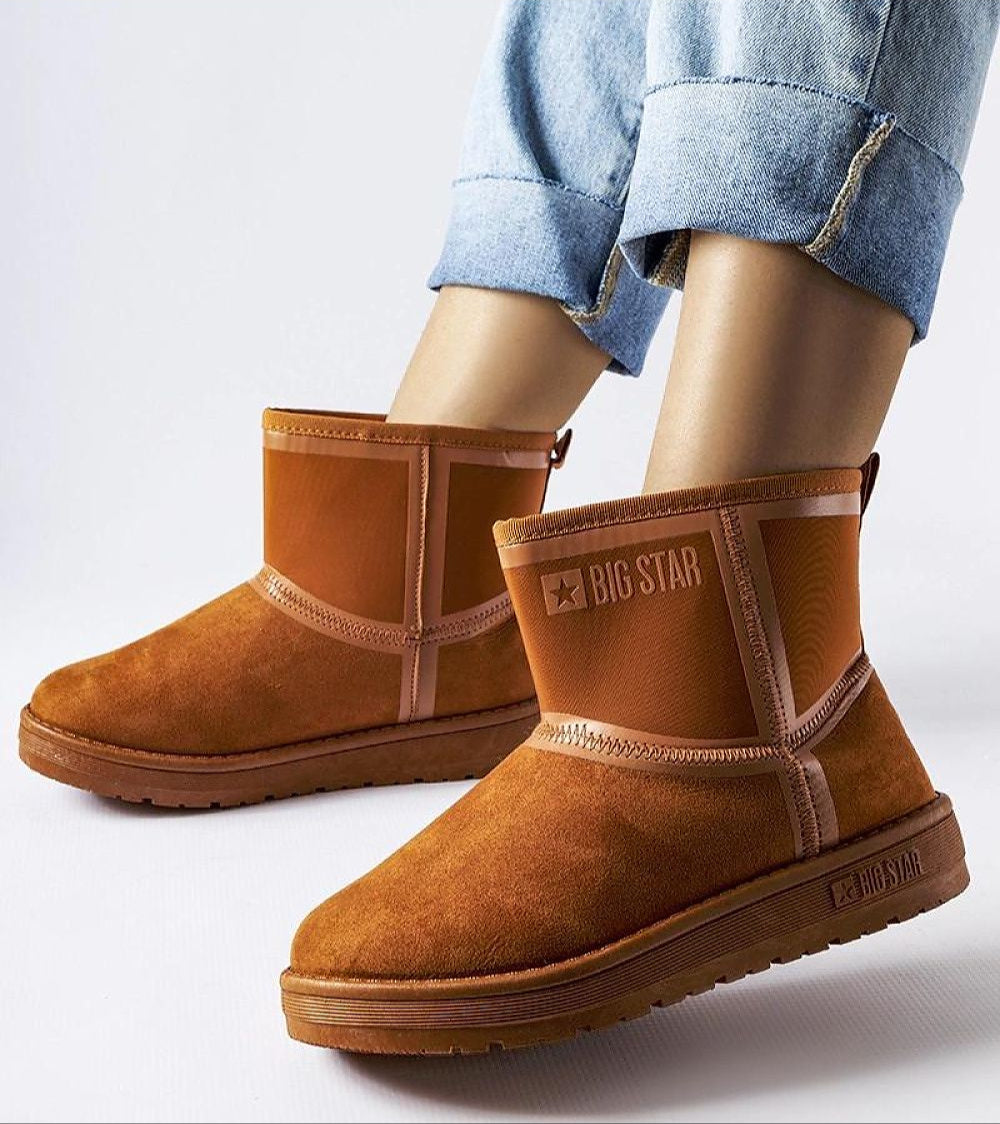 Silvoya Big Star insulated snow boots in brown eco leather with platform sole, worn with jeans, ideal for cold-weather outfits.