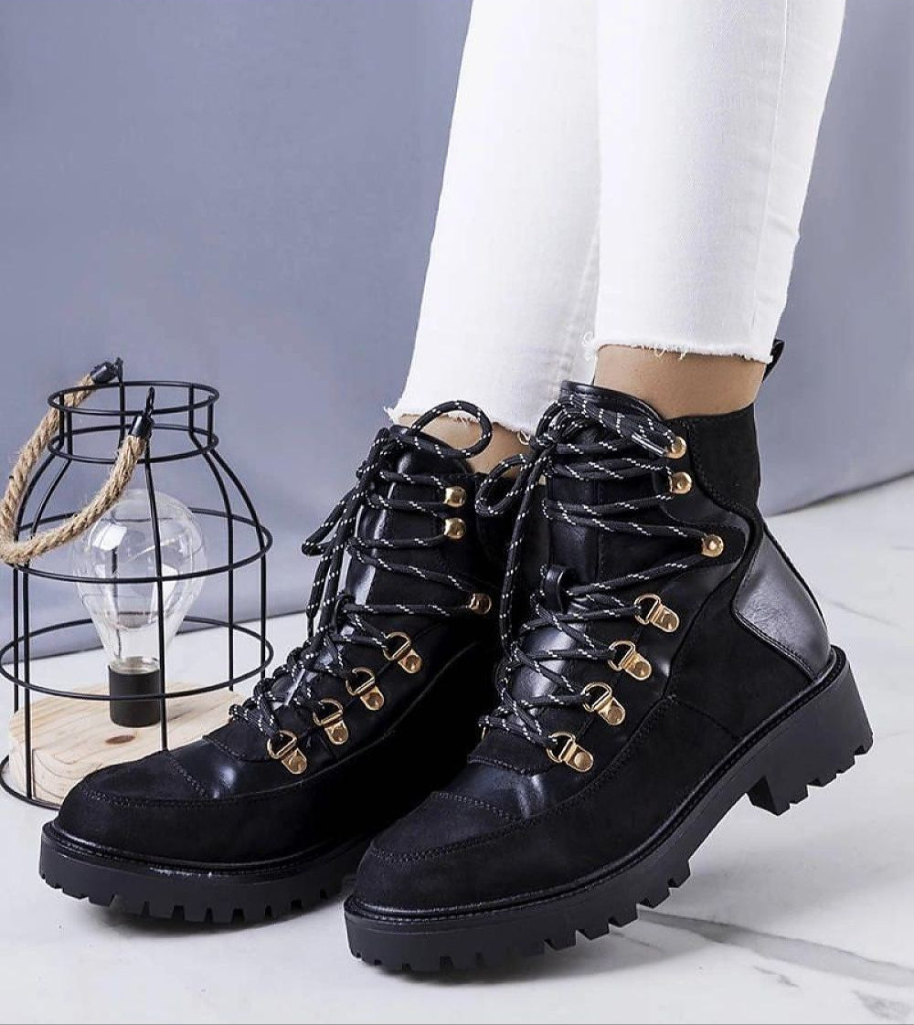 Maelira insulated lace-up boots with fur-like lining, eco leather and suede textures, featuring gold-tone details and rubber sole.