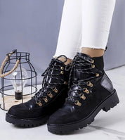 Maelira insulated lace-up boots with fur-like lining, eco leather and suede textures, featuring gold-tone details and rubber sole.