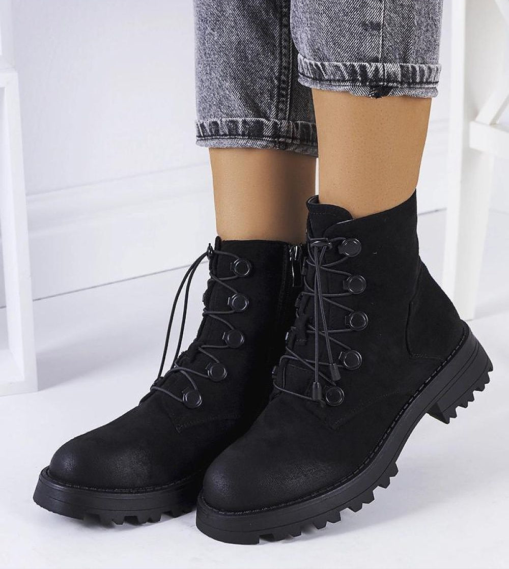 Black Virelda eco-suede ankle boots with thick ridged sole, lace-up front, and side zipper, perfect for autumn and winter.