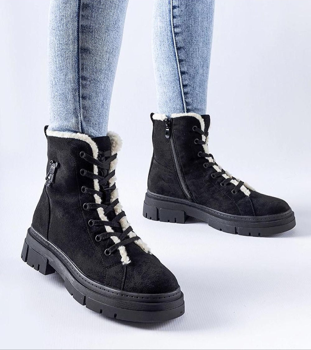 Black eco-suede platform boots with side zipper and insulated lining, perfect for winter fashion and versatile urban style.