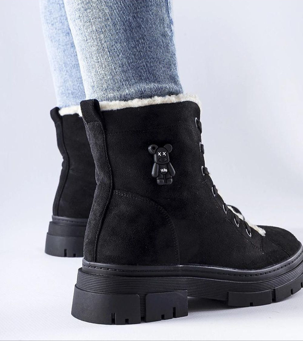 Pombera suede platform boots in black, featuring eco-suede texture, side zipper, plush lining, and chunky sole for winter style and comfort.