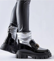 Nevelle Insulated Lacquered Snow Boots in black and silver, featuring a glossy finish, side zipper, and sturdy rubber sole for winter wear.