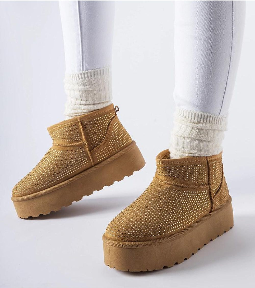 Velizia Platform Snow Boots with Zircons, featuring insulated eco leather and platform sole, styled with white leggings.