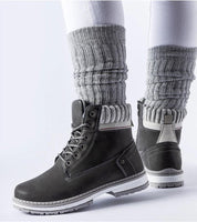 Black Veltrana Waterproof Insulated Trappers with high ankle cut, eco leather, soft insulation, and side zipper for winter comfort.