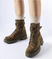 Castore Green Suede Platform Baggers displaying eco-suede material, green sole, and platform design with laces and zipper.