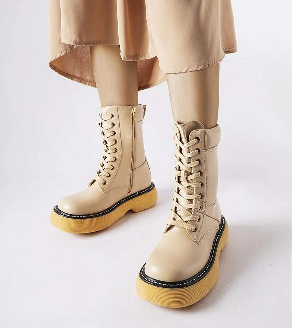 Davi Platform Bagger Boots with rounded toe, elevated sole, and side zipper, offering warmth and style. Ideal for winter fashion.