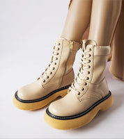 Beige Davi Platform Bagger Boots with elevated sole and side zipper, offering style and warmth with cozy insulated lining.