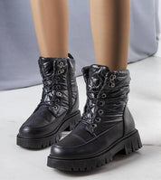 Andlina black waterproof fur-lined snow boots with high gripping sole, ideal for winter protection and style.