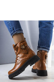 Coanira brown trapper boots with mini padlock, embossed eco leather, faux fur lining, worn with jeans, stylish winter footwear.