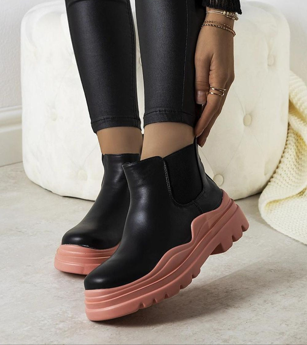 Ravela black boots with pink platform, elastic side inserts, eco leather, vibrant pink sole, perfect for autumn-winter fashion.