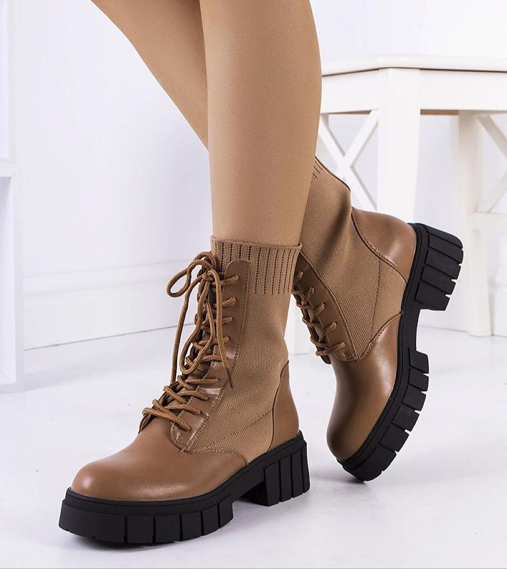 Braveda brown elastic-top boots with lace-up design, black treaded sole, and eco leather finish for comfort and style.