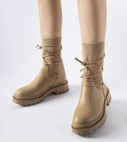 Calmira Beige Sock Boots with round toe, sculpted sole, and 5.5 cm heel. Insulated slip-on design perfect for city streets or weekends.