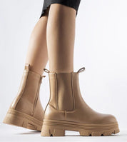 Varelia Insulated Platform Boots in beige eco leather with side zipper viewed from the side, showcasing modern and warm design for winter.